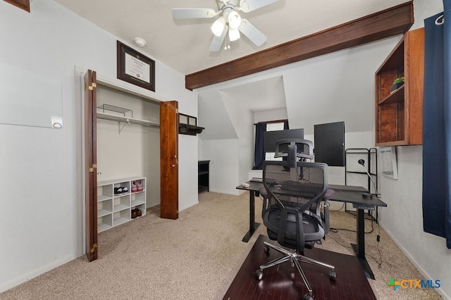 carpeted home office with ceiling fan and beam ceiling