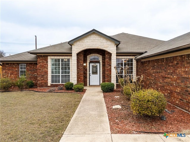 exterior space featuring a front yard