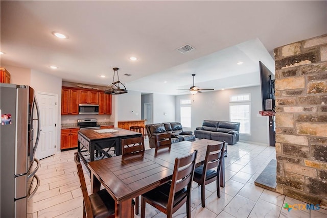 dining area with ceiling fan, visible vents, and recessed lighting