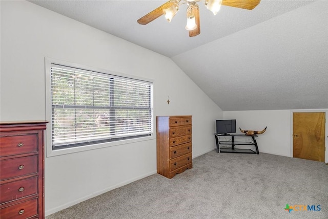 205 Magdalena Dr, Victoria, TX 77904 - interior space with light colored carpet, plenty of natural light, ceiling fan, and lofted ceiling