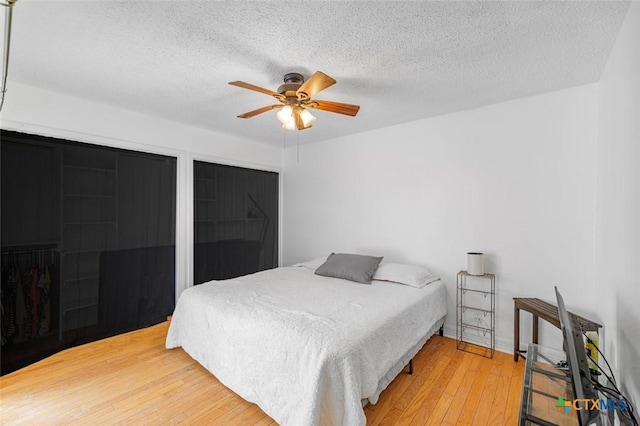 205 Magdalena Dr, Victoria, TX 77904 - bedroom with a textured ceiling, ceiling fan, and hardwood / wood-style floors