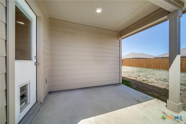 view of patio / terrace with fence