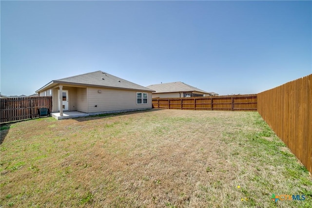 view of yard featuring cooling unit and a fenced backyard