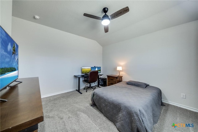 bedroom featuring carpet floors, baseboards, and vaulted ceiling