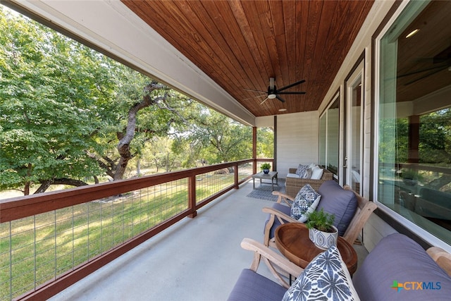 1175 Lavaca, Canyon Lake, TX 78133 - view of patio / terrace with ceiling fan and a balcony