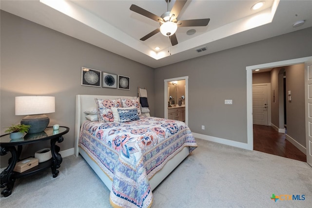 1175 Lavaca, Canyon Lake, TX 78133 - carpeted bedroom featuring a raised ceiling, baseboards, visible vents, and recessed lighting