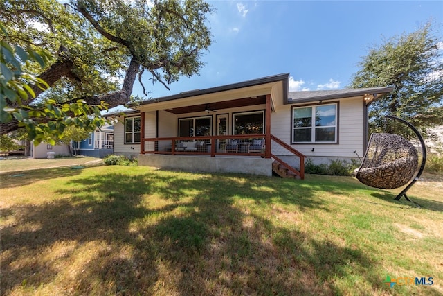 1175 Lavaca, Canyon Lake, TX 78133 - rear view of property featuring a porch, a lawn, and ceiling fan