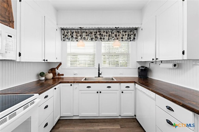 8410 Alaska Ave, Temple, TX 76502 - kitchen featuring wooden counters, white appliances, white cabinetry, dark wood finished floors, and hanging light fixtures