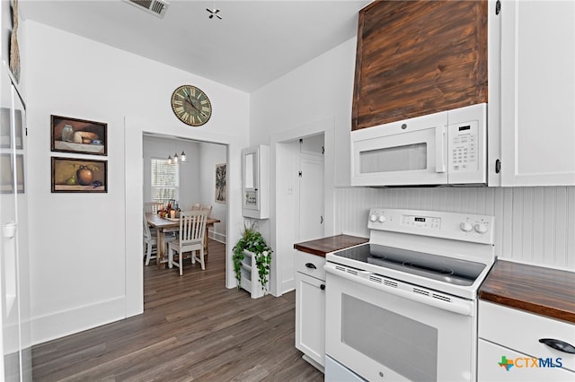 kitchen featuring white cabinetry, dark hardwood / wood-style floors, white appliances, and an inviting chandelier