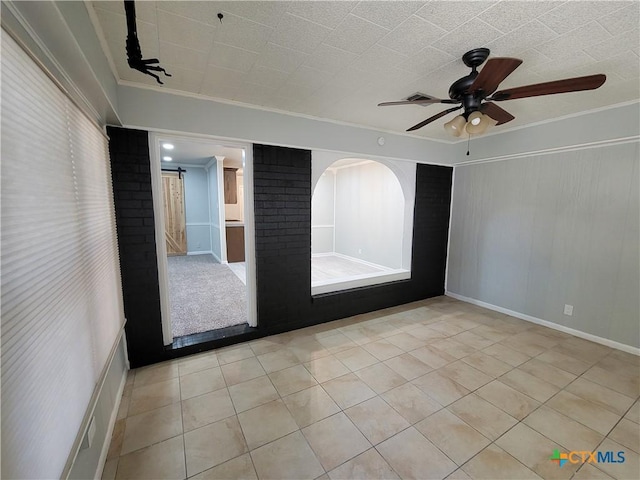 4106 Ermine Trl, Temple, TX 76504 - spare room featuring ornamental molding, light tile patterned floors, and ceiling fan