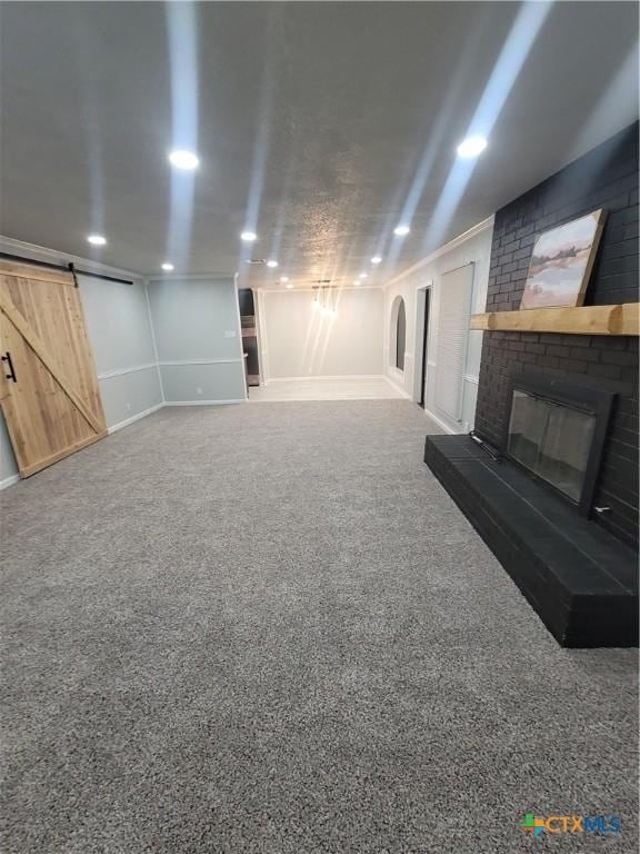 4106 Ermine Trl, Temple, TX 76504 - finished basement with a fireplace and a barn door