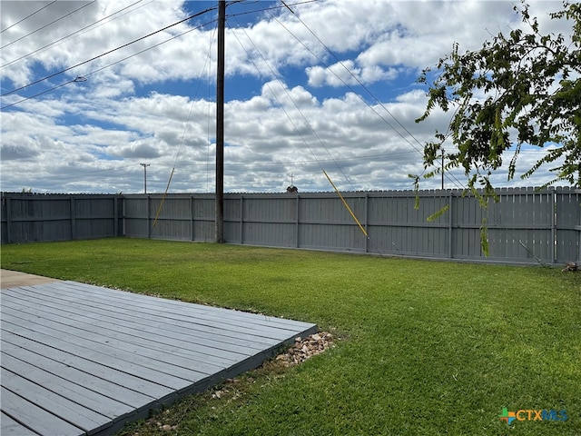 view of yard with a deck