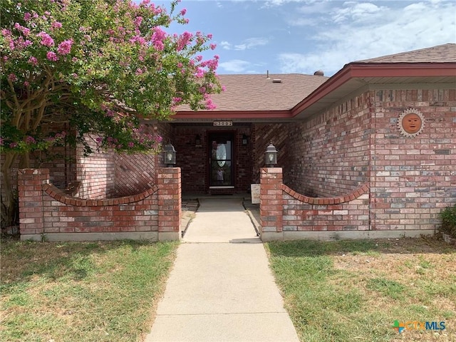 3002 Veterans Ave, Copperas Cove, TX 76522 - entrance to property featuring brick siding and roof with shingles