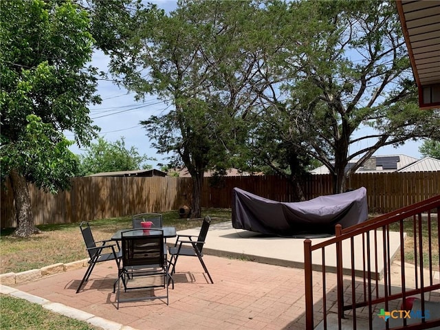 3002 Veterans Ave, Copperas Cove, TX 76522 - fenced backyard with a patio area and outdoor dining area