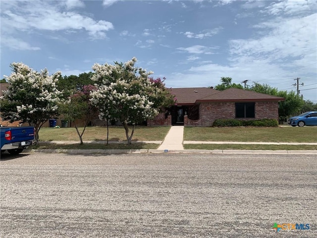 3002 Veterans Ave, Copperas Cove, TX 76522 - view of front of house with a front yard and brick siding
