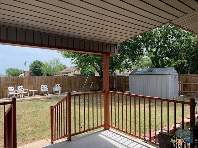 3002 Veterans Ave, Copperas Cove, TX 76522 - wooden terrace with a fenced backyard and a storage shed