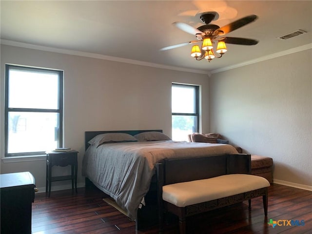 3002 Veterans Ave, Copperas Cove, TX 76522 - bedroom with dark wood-style flooring, ornamental molding, and a ceiling fan