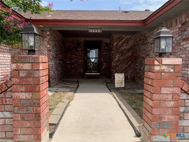 3002 Veterans Ave, Copperas Cove, TX 76522 - view of exterior entry featuring brick siding and roof with shingles