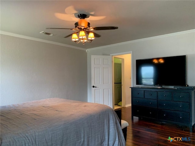 3002 Veterans Ave, Copperas Cove, TX 76522 - bedroom with dark wood finished floors, crown molding, and ceiling fan