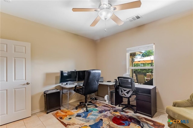 1518 Skyline Dr, Kingsland, TX 78639 - office area featuring light tile patterned floors, ceiling fan, and baseboards