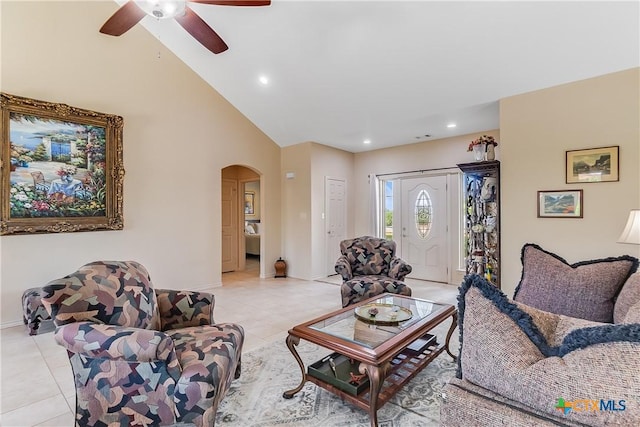 1518 Skyline Dr, Kingsland, TX 78639 - living area featuring arched walkways, light tile patterned floors, ceiling fan, baseboards, and recessed lighting