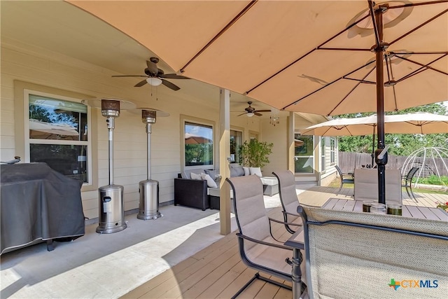 1518 Skyline Dr, Kingsland, TX 78639 - deck featuring outdoor dining space, ceiling fan, and an outdoor living space