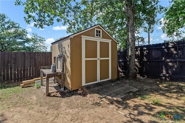 1518 Skyline Dr, Kingsland, TX 78639 - view of shed with a fenced backyard