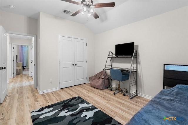 705 Juniper Dr, Troy, TX 76579 - bedroom with light wood-style flooring, lofted ceiling, a ceiling fan, and a closet