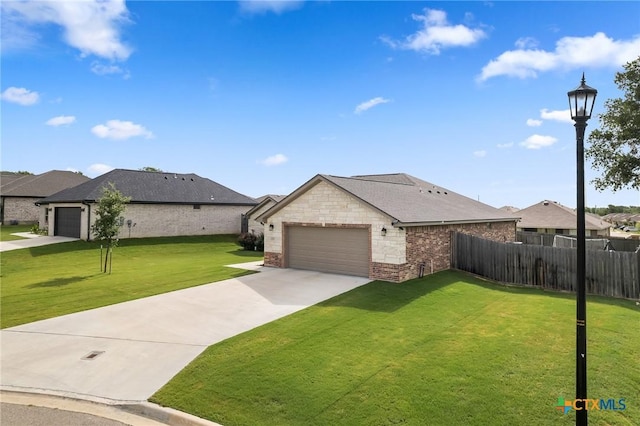 705 Juniper Dr, Troy, TX 76579 - view of front of property featuring brick siding, concrete driveway, a residential view, and a garage