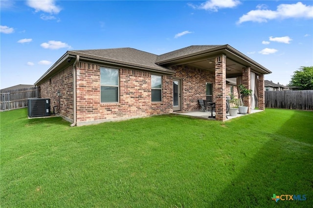 705 Juniper Dr, Troy, TX 76579 - rear view of property with brick siding, a fenced backyard, a patio, and a shingled roof