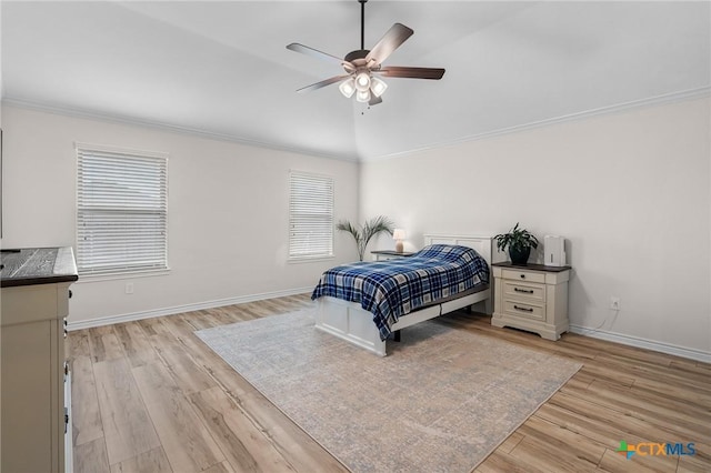705 Juniper Dr, Troy, TX 76579 - bedroom featuring crown molding, light wood-type flooring, vaulted ceiling, and a ceiling fan