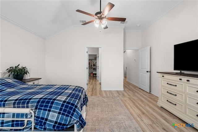 705 Juniper Dr, Troy, TX 76579 - bedroom featuring ornamental molding, lofted ceiling, light wood-style flooring, and a ceiling fan