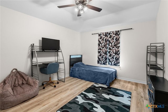 705 Juniper Dr, Troy, TX 76579 - bedroom featuring wood finished floors and a ceiling fan