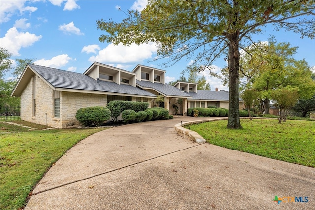 view of front of home with a front yard