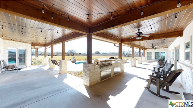 view of patio / terrace with grilling area, area for grilling, and ceiling fan