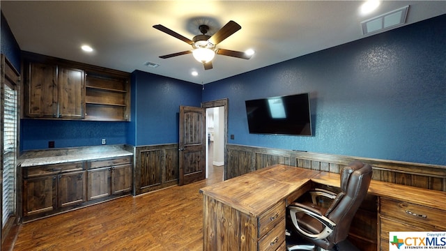 office area with ceiling fan and dark hardwood / wood-style flooring