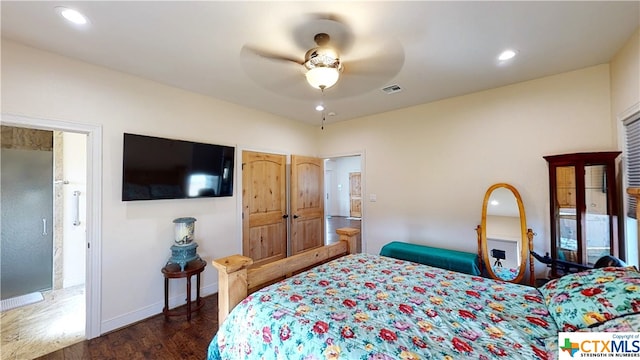 bedroom with dark wood-type flooring and ceiling fan