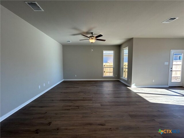 kitchen with a wealth of natural light, appliances with stainless steel finishes, lofted ceiling, and light hardwood / wood-style flooring