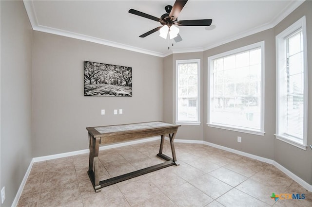 office space featuring crown molding and baseboards