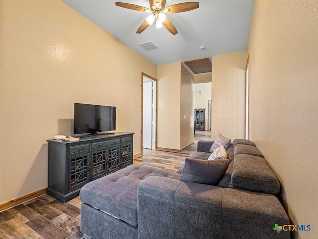 12093 Sulphur Springs Rd, Adkins, TX 78101 - living room featuring dark wood-style floors, a ceiling fan, and baseboards