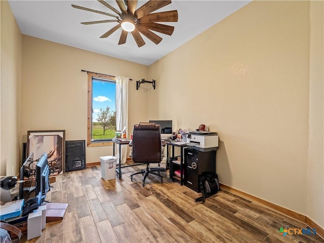 12093 Sulphur Springs Rd, Adkins, TX 78101 - office space featuring ceiling fan, wood finished floors, and baseboards