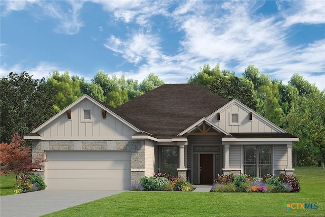 view of front facade with a garage and a front yard