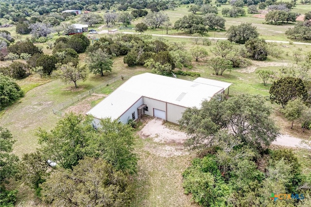 birds eye view of property featuring a rural view