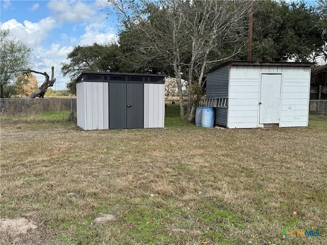 view of outdoor structure with a yard