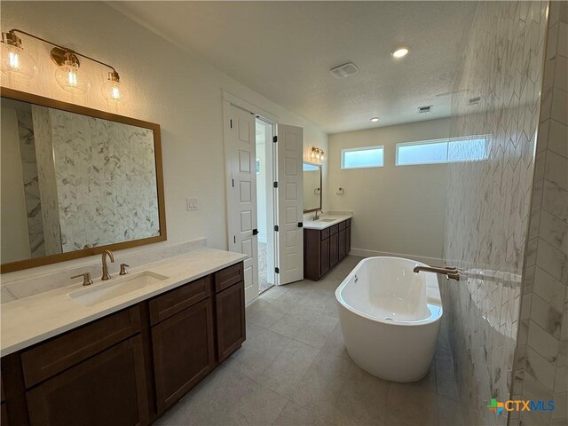 901 High Plains Dr, Nolanville, TX 76559 - living room with light wood-type flooring, a chandelier, beamed ceiling, baseboards, and recessed lighting