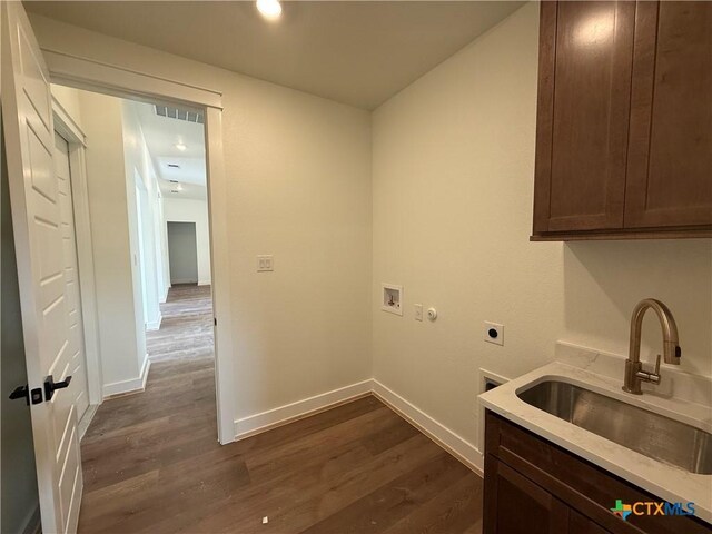 901 High Plains Dr, Nolanville, TX 76559 - laundry room with electric dryer hookup, cabinet space, hookup for a washing machine, and dark wood-type flooring