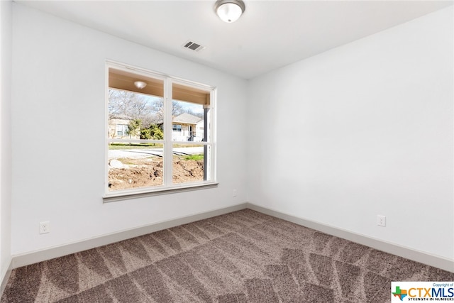 view of carpeted spare room