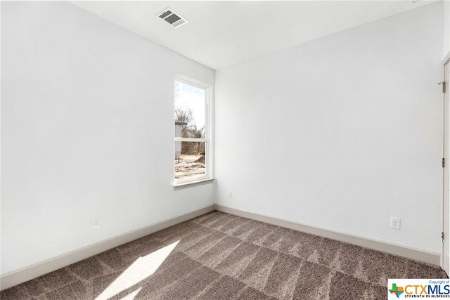 view of carpeted spare room