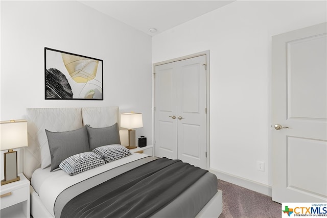 carpeted bedroom with a closet