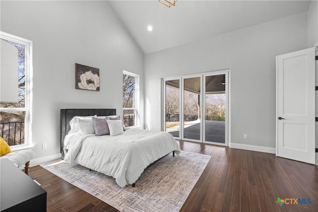 bedroom featuring baseboards, dark wood-type flooring, access to outside, high vaulted ceiling, and recessed lighting